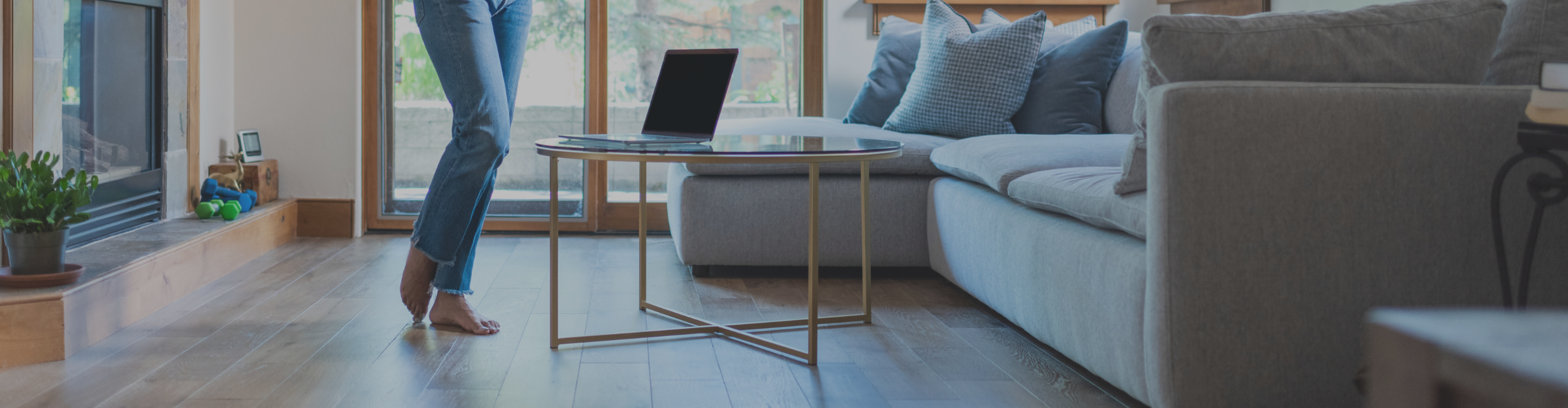 Cozy living room with elegant hardwood flooring. Explore flooring options like hardwood, laminate, and vinyl at your trusted local flooring store.