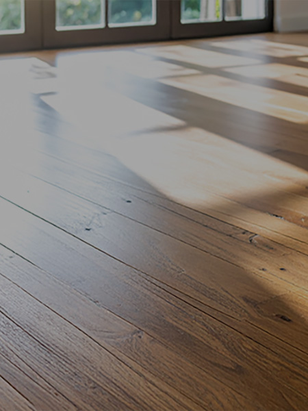 "Bedroom with hardwood flooring "